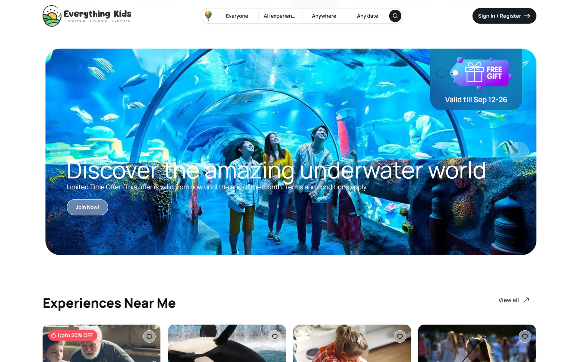 Everything Kids: the compact search bar above a promotional banner and a row of experiences near the visitor